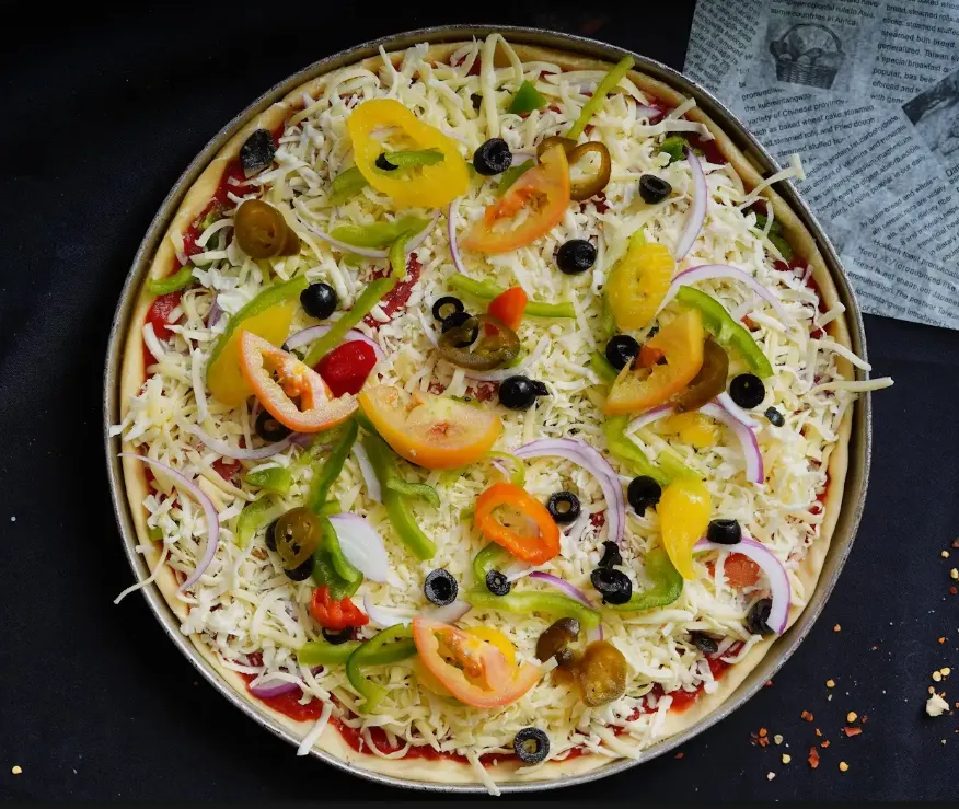 Loaded vegetable pizza at Pizzaberg Cafe Okotoks